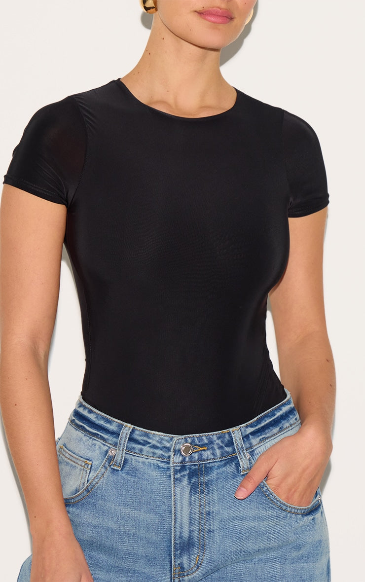 https://cdn-img.prettylittlething.com/5/d/5/c/5d5caca096cbdd78b6ba8c213bad287008b52ef2_CNF0742_4_black_basic_slinky_short_sleeve_bodysuit.jpg
